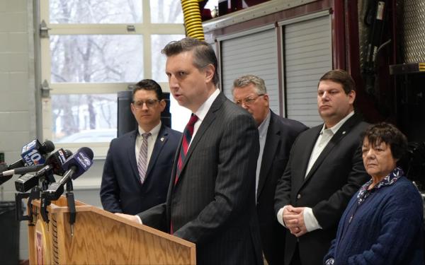 Rep. Magaziner speaks at a podium