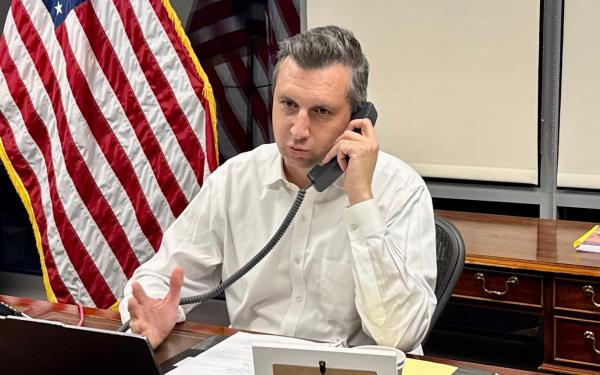 Rep. Seth Magaziner speaks during a telephone town hall event.