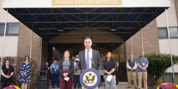 Magaziner at press conference