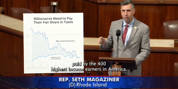 Rep. Magaziner in front of a graph