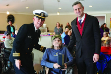Magaziner and two other men stand together